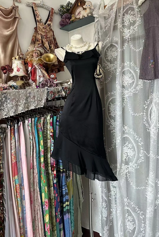 Black halter-neck fitted midi ball gown with an asymmetrical hem R7808