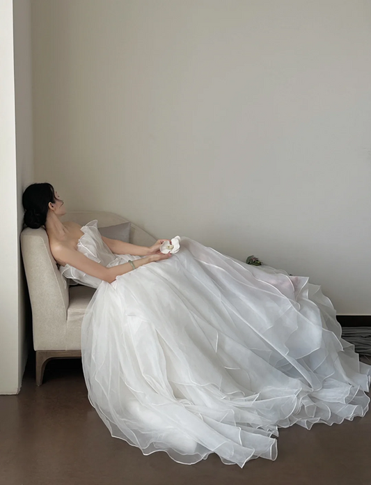 White strapless waist‑cinched slim‑fit ball gown with a full ruffled skirt, wedding dress R8008