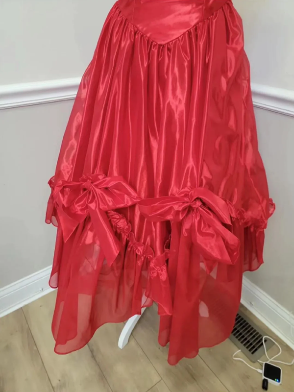 Red strapless ball gown with a cinched waist and an asymmetrical skirt; bridal gown R7297