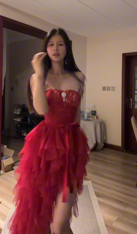 Red strapless, fitted waist, cake-style, irregular hem ball gown R7549