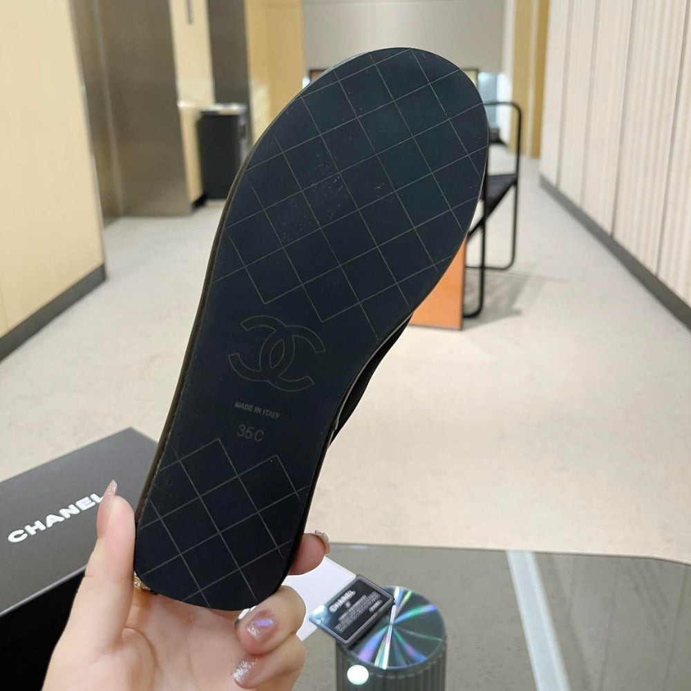 Chanel CC Logo Criss Cross Slides Black
