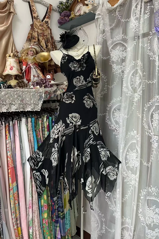 Black halter-neck rose print fitted long ball gown with an asymmetrical hem R7829