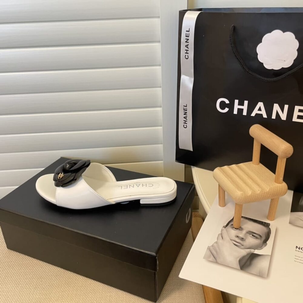 Chanel Black Camellia Slides White