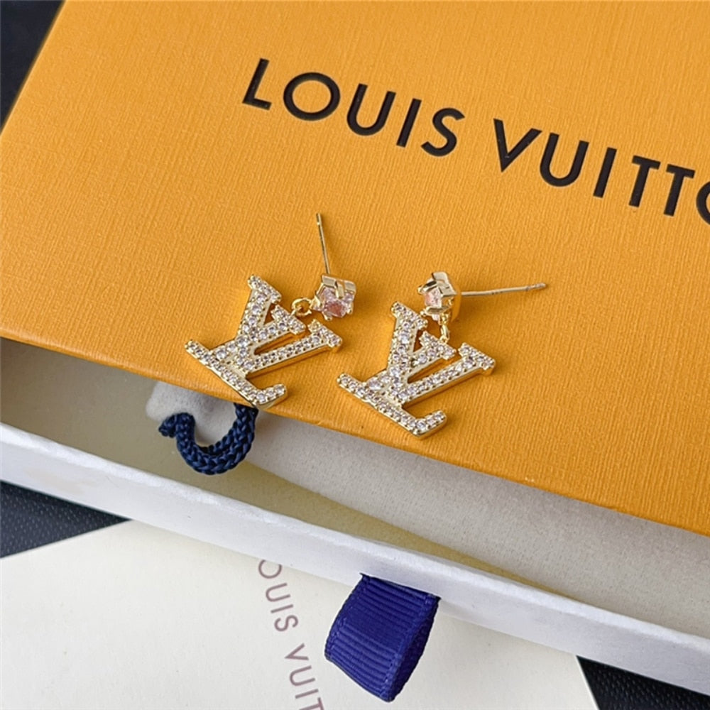 LOUIS VUITTON LADY LV EARRINGS GOLD TONE M01844