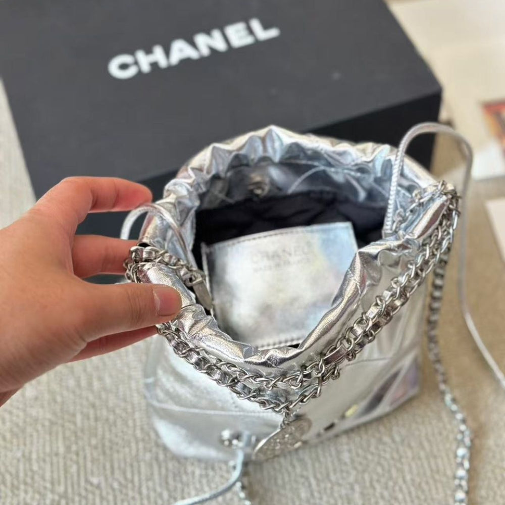 Chanel 22 Mini Handbag Shiny And Gold Tone Metal Silver 20cm
