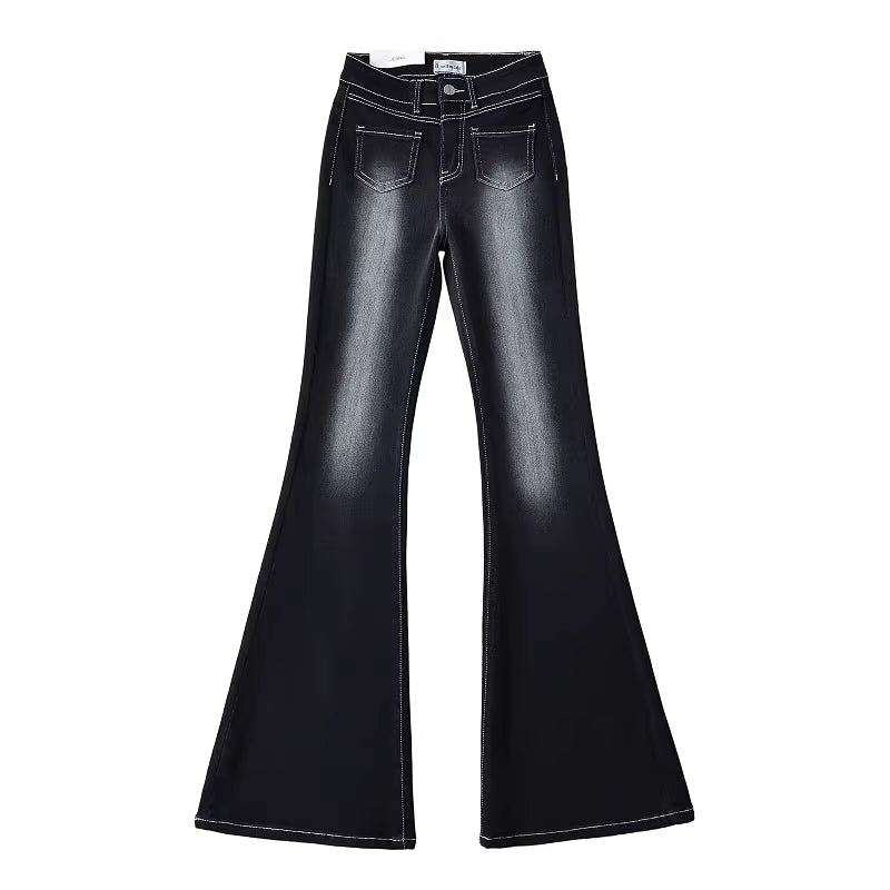 Women's slim-fit, retro-style high-waisted floor-length jeans with visible stitching and front pockets. 11418