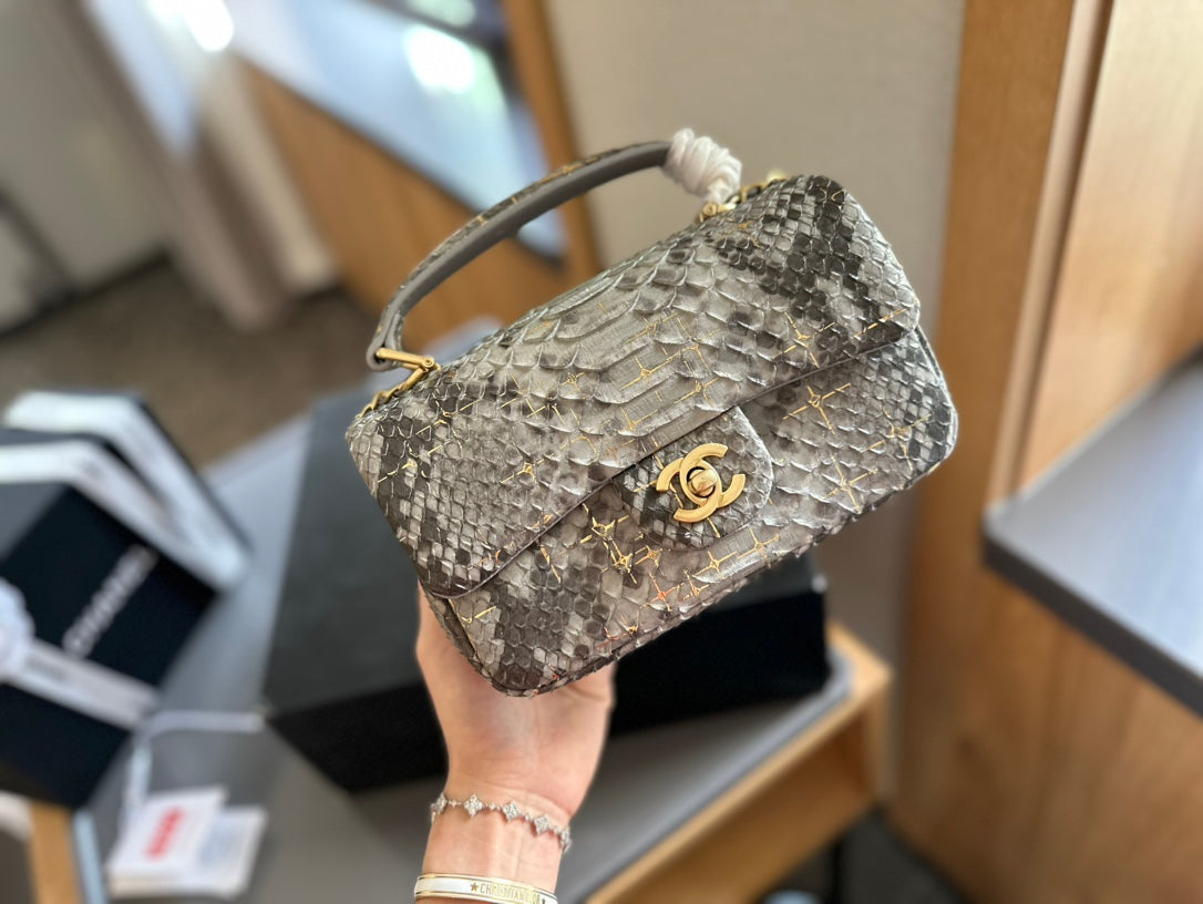 Chanel Mini Flap Bag with Top Handle in python