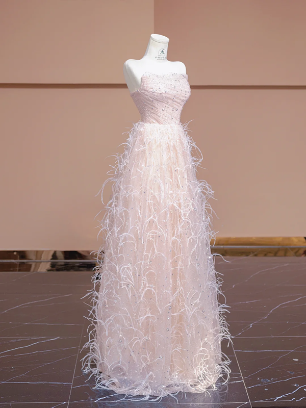 Light pink strapless, fitted waist, long ball gown with feather skirt design; bridal gown R8345