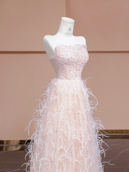 Light pink strapless, fitted waist, long ball gown with feather skirt design; bridal gown R8345