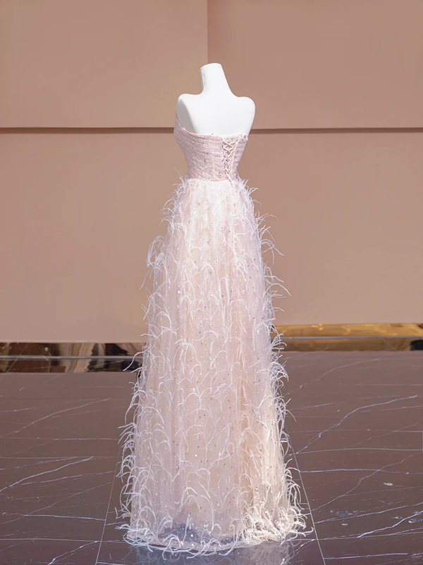 Light pink strapless, fitted waist, long ball gown with feather skirt design; bridal gown R8345