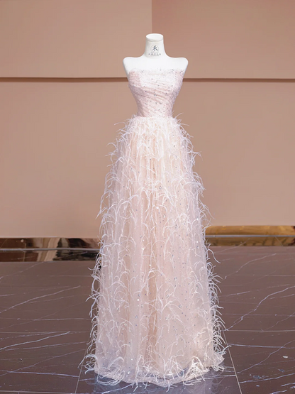 Light pink strapless, fitted waist, long ball gown with feather skirt design; bridal gown R8345