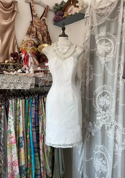 White sleeveless halter neck fitted short ball gown R7457