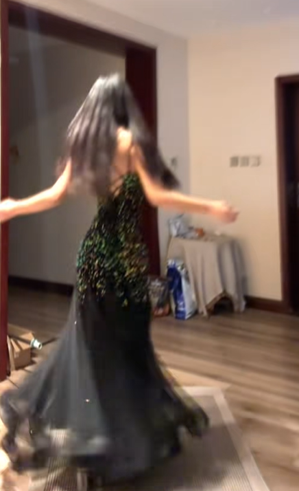 Sexy ball gown with black halter neck, fitted waist, and sequined fishtail skirt. R8065