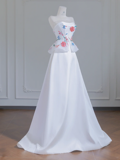 White strapless beaded floral dress with a fitted waist, A-line silhouette, and long ball gown R8243