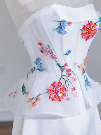 White strapless beaded floral dress with a fitted waist, A-line silhouette, and long ball gown R8243