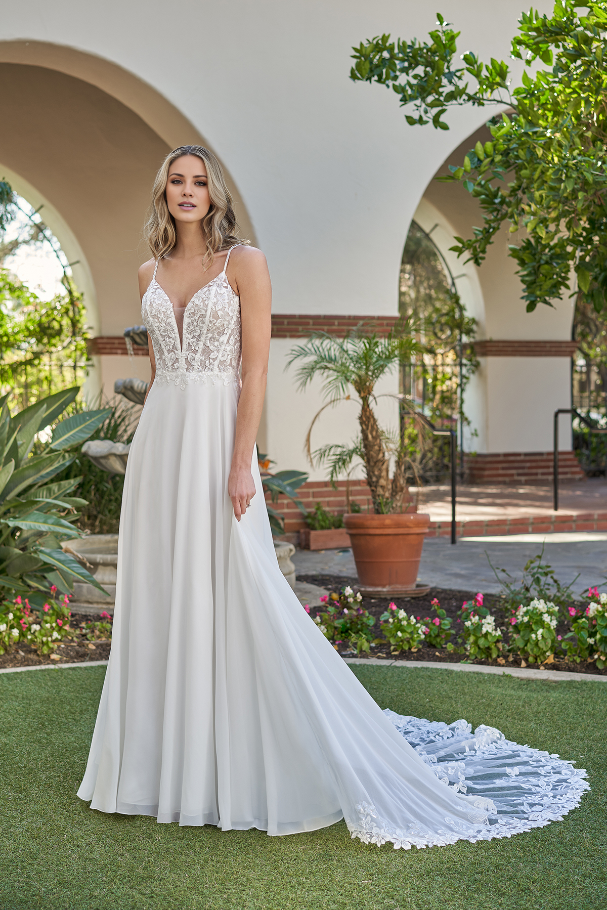 A-line tight corset with beaded thin shoulder straps and floor length wedding dress