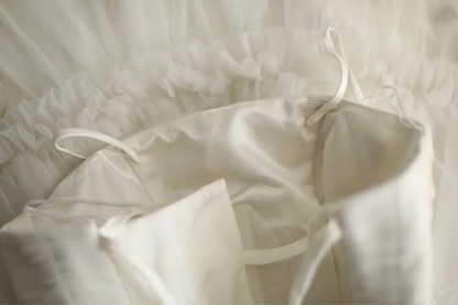 White halter-neck fitted long ball gown with a full skirt R6705