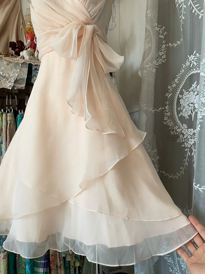 Apricot pink halter-neck mini dress with a fitted waist, a ball gown R6272