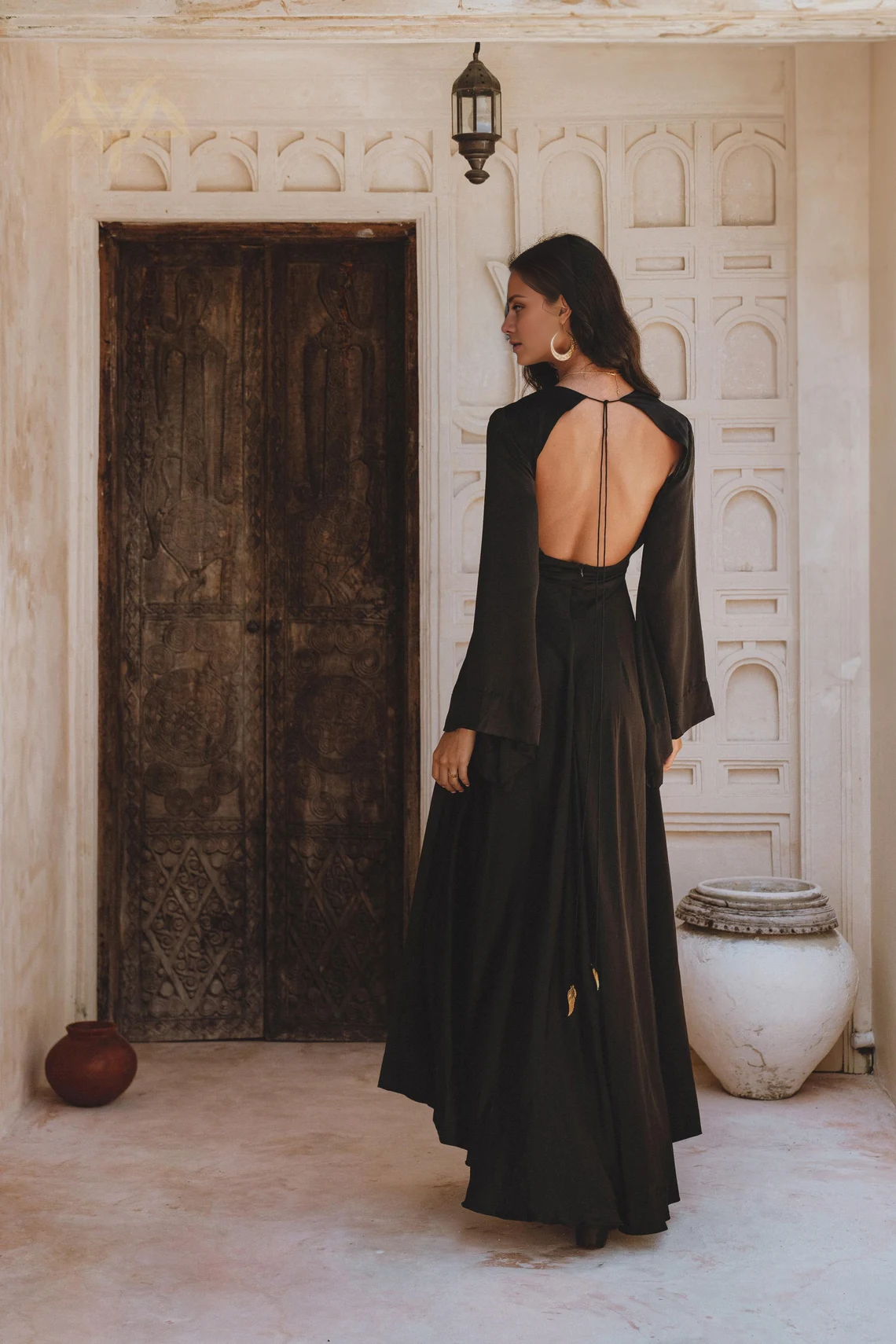 V-neck long sleeved backless and floor length evening dress