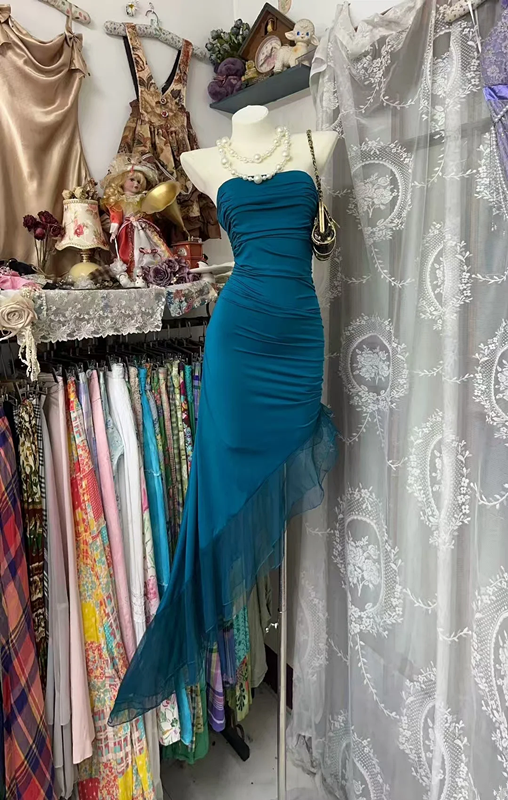 Dark blue strapless, fitted, long ball gown with an asymmetrical hem R7873