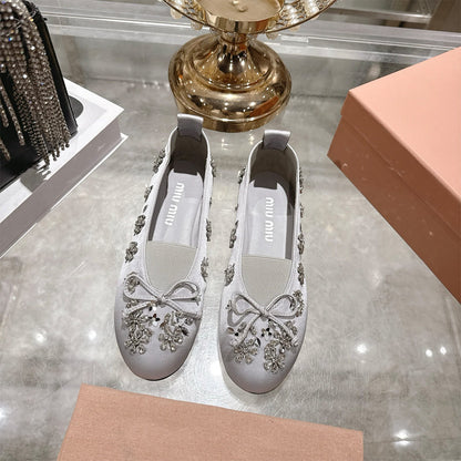 MIUMIU Satin ballerinas