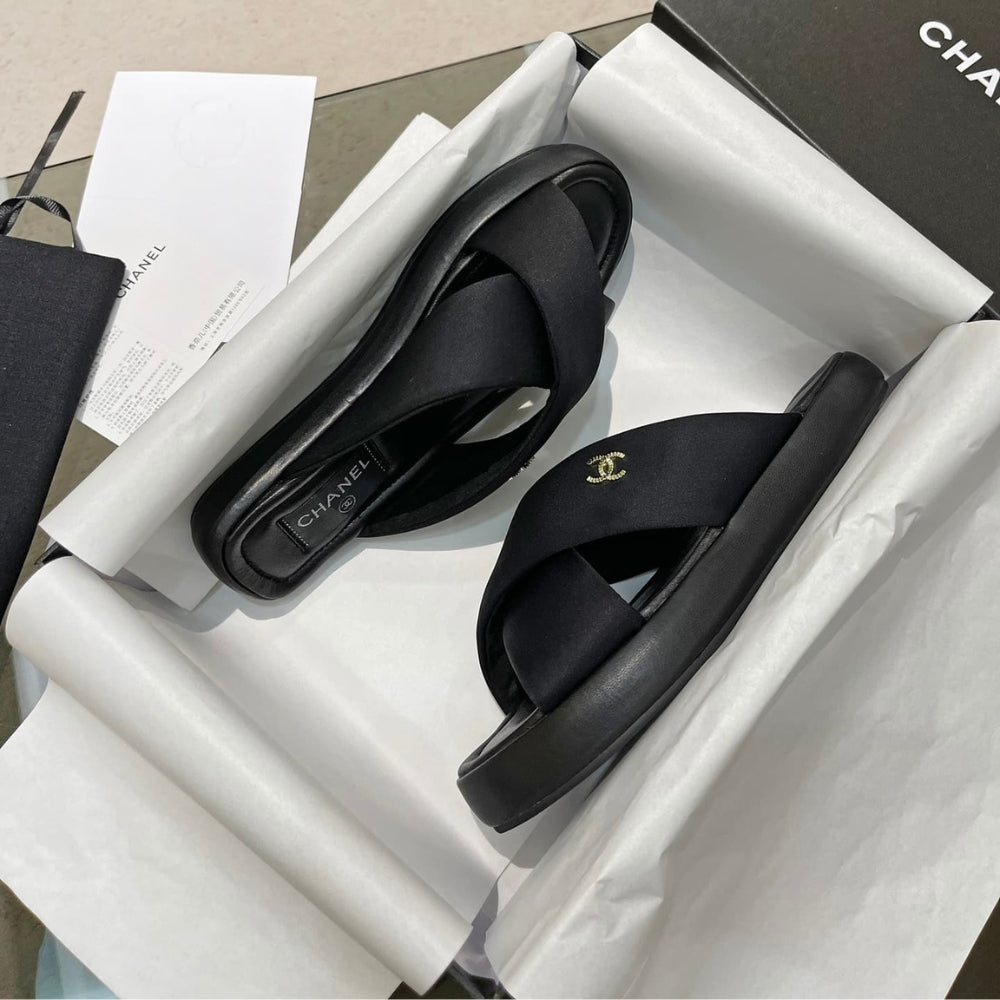 Chanel CC Logo Criss Cross Slides Black
