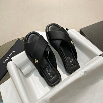 Chanel CC Logo Criss Cross Slides Black