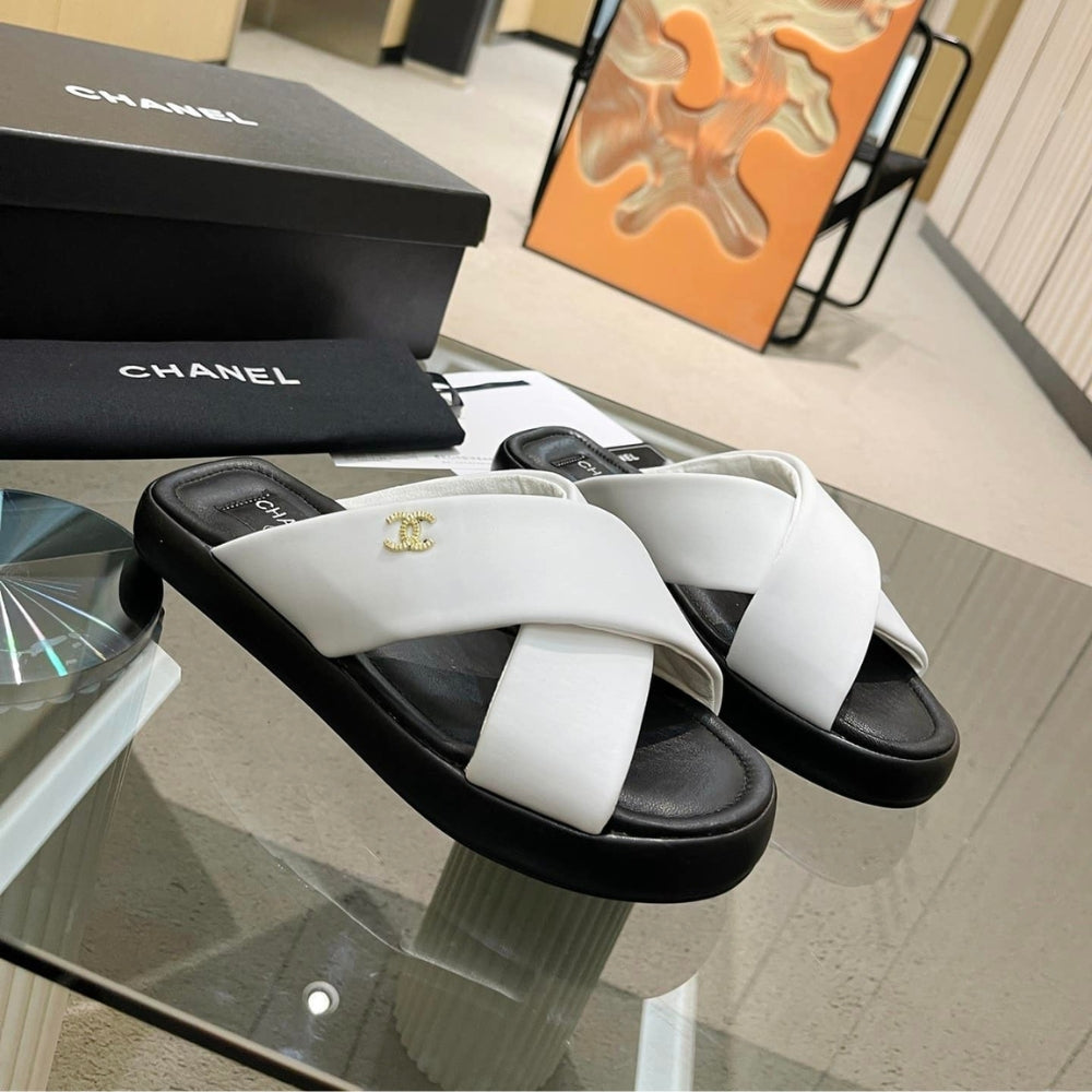Chanel CC Logo Criss Cross Slides White