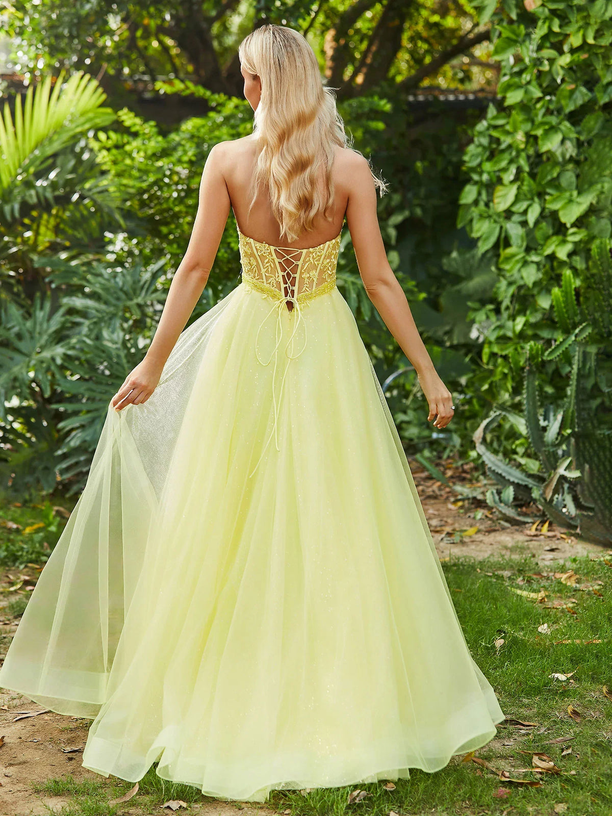 A-line slit strapless transparent adhesive bone tight sheer dress