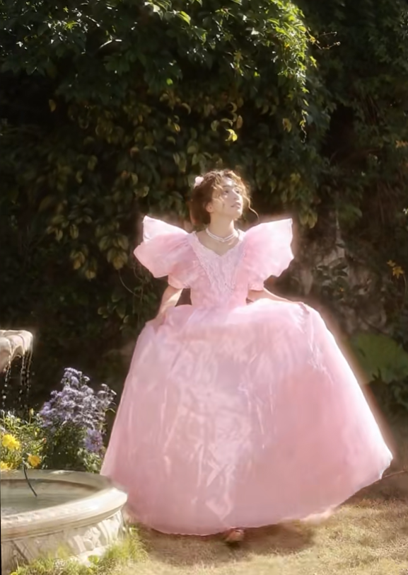 Pink floor-length ball gown with a cinched waist and slim fit, exuding elegance; bridal gown R7280
