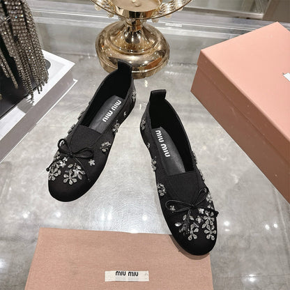 MIUMIU Satin ballerinas