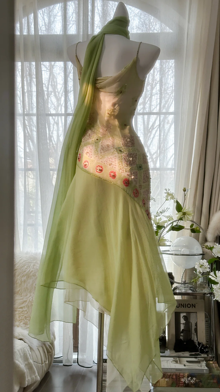 Light yellow-green halter-neck fitted long ball gown with an asymmetrical hem R7679