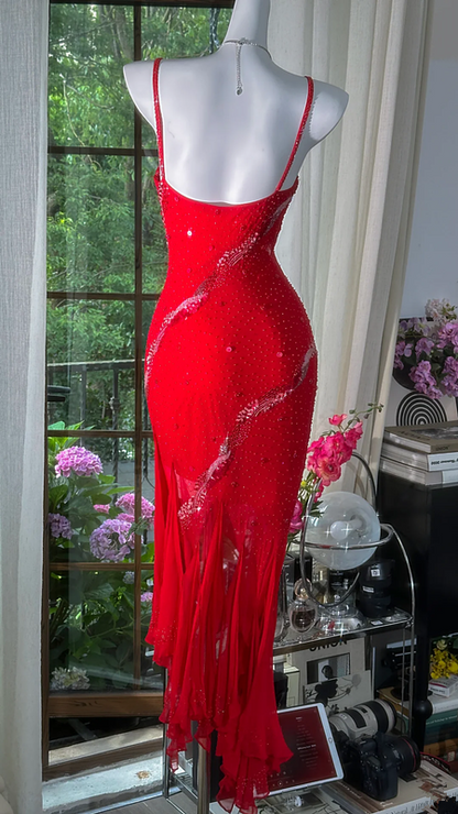 Red halter-neck fitted long ball gown with an asymmetrical hem R7680