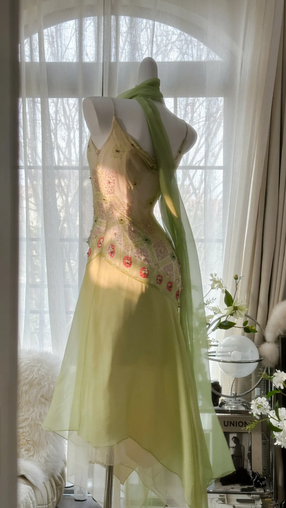 Light yellow-green halter-neck fitted long ball gown with an asymmetrical hem R7679