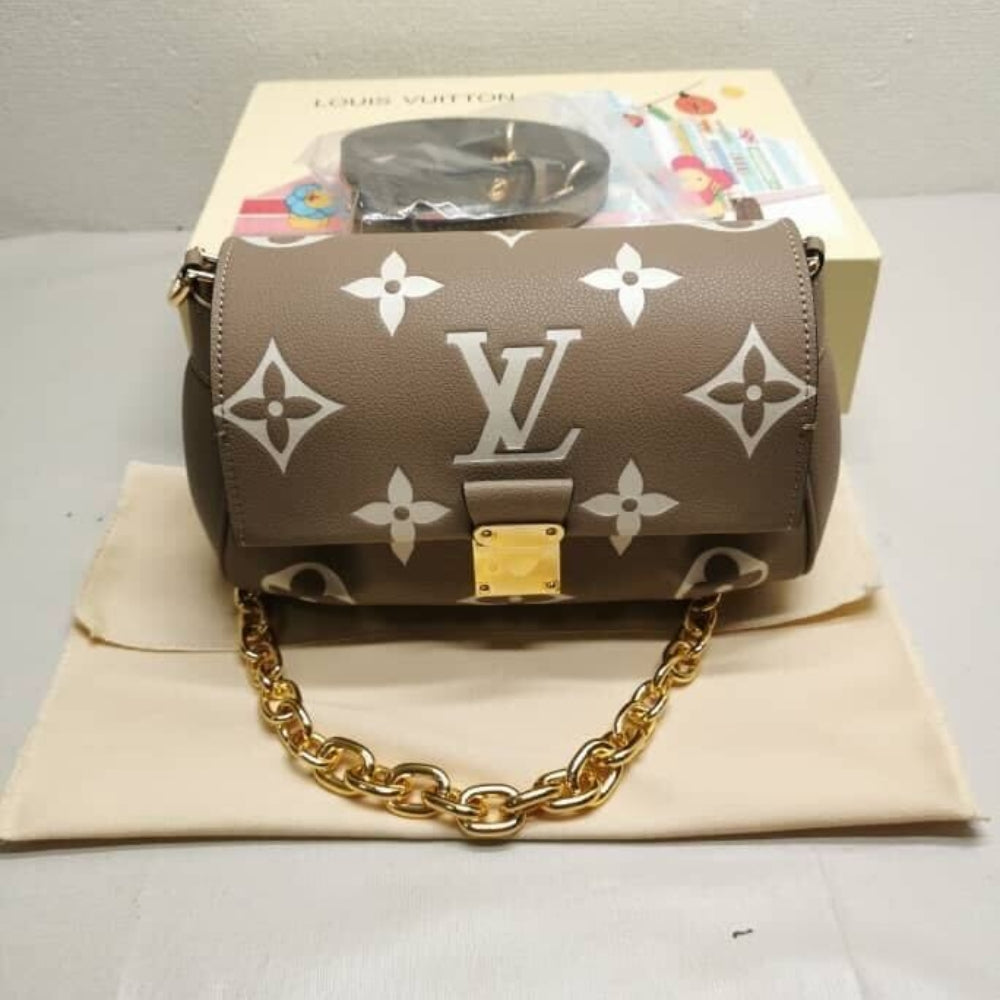 Louis Vuitton Favorite Bicolor Monogram Empreinte Leather Beige 24Cm M45836