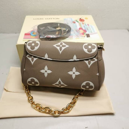 Louis Vuitton Favorite Bicolor Monogram Empreinte Leather Beige 24Cm M45836
