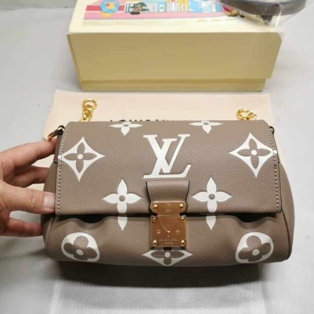Louis Vuitton Favorite Bicolor Monogram Empreinte Leather Beige 24Cm M45836