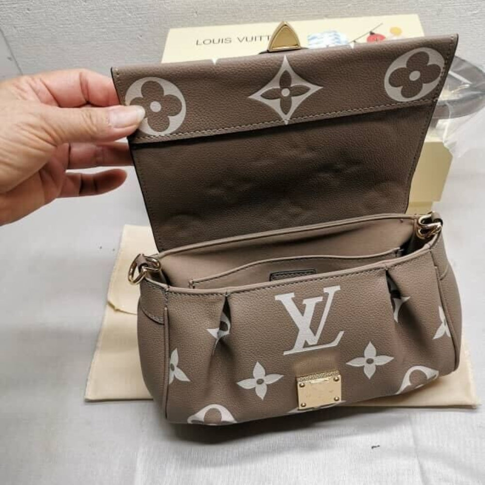 Louis Vuitton Favorite Bicolor Monogram Empreinte Leather Beige 24Cm M45836