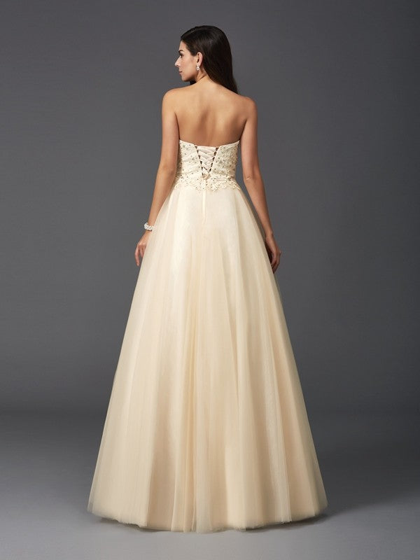 A-Line/Princess Sweetheart Beading Sleeveless Long Net Dresses