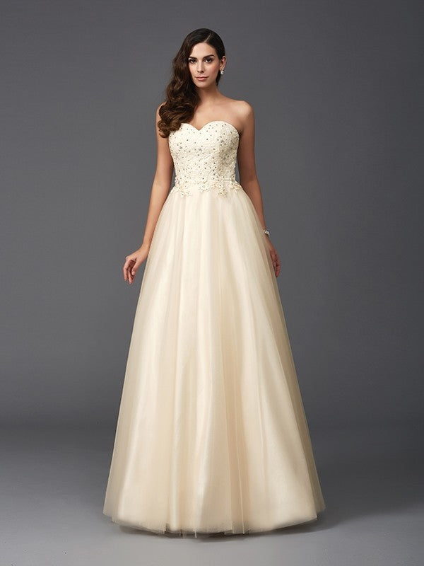 A-Line/Princess Sweetheart Beading Sleeveless Long Net Dresses