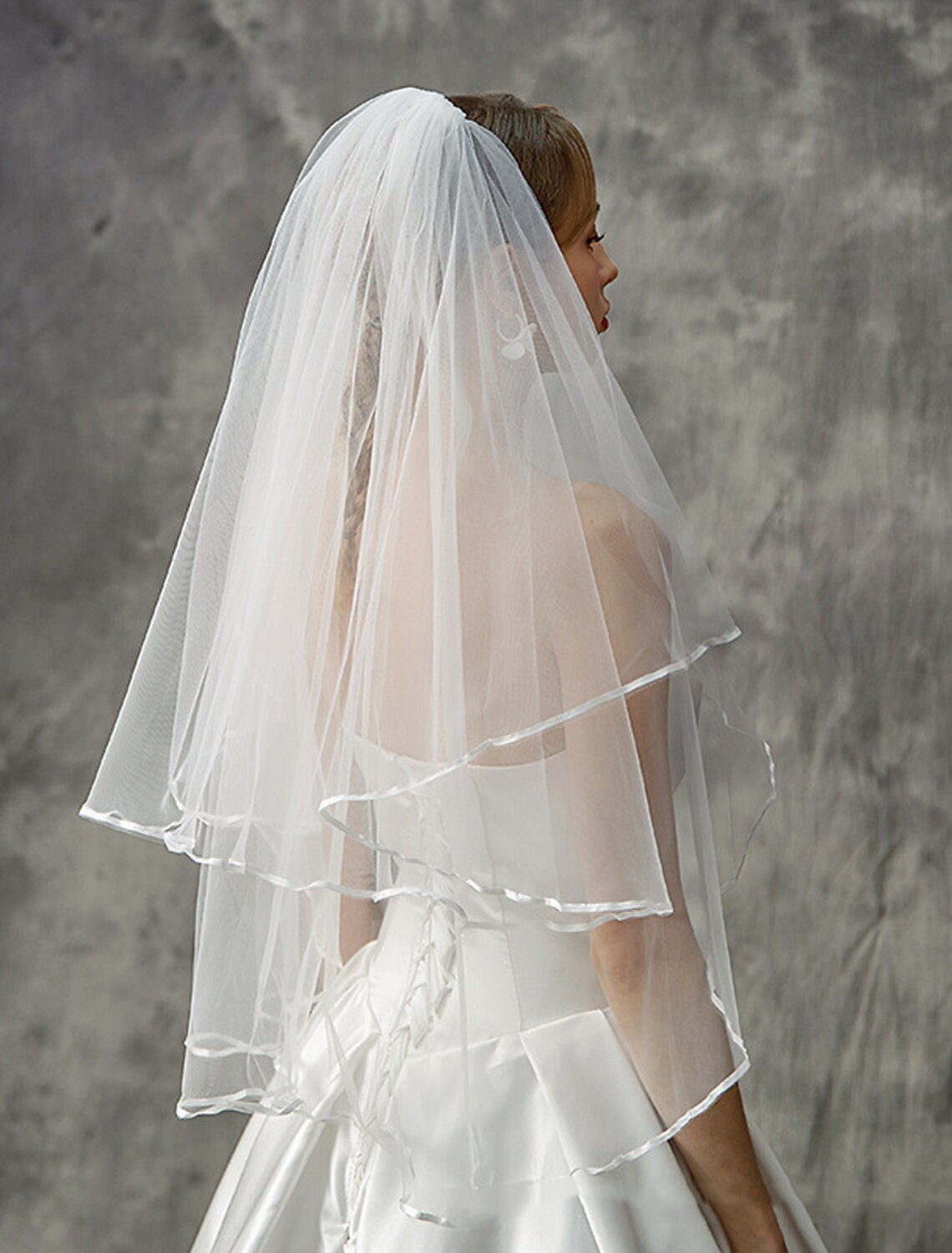 - Double layered fashion/European wedding veil with elbow veil paired with layered/solid color chiffon dress leaving a deep impression in 2026