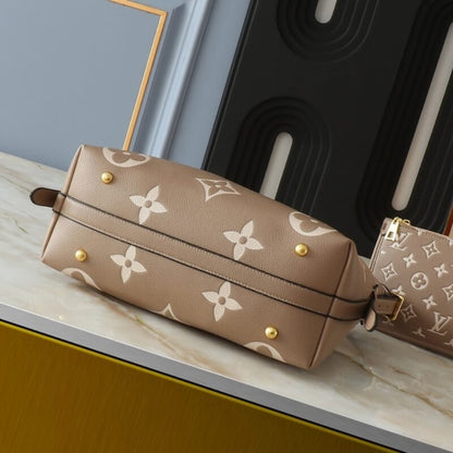Louis Vuitton Carryall PM Bicolor Monogram Empreinte Dove And Cream 29Cm M47180