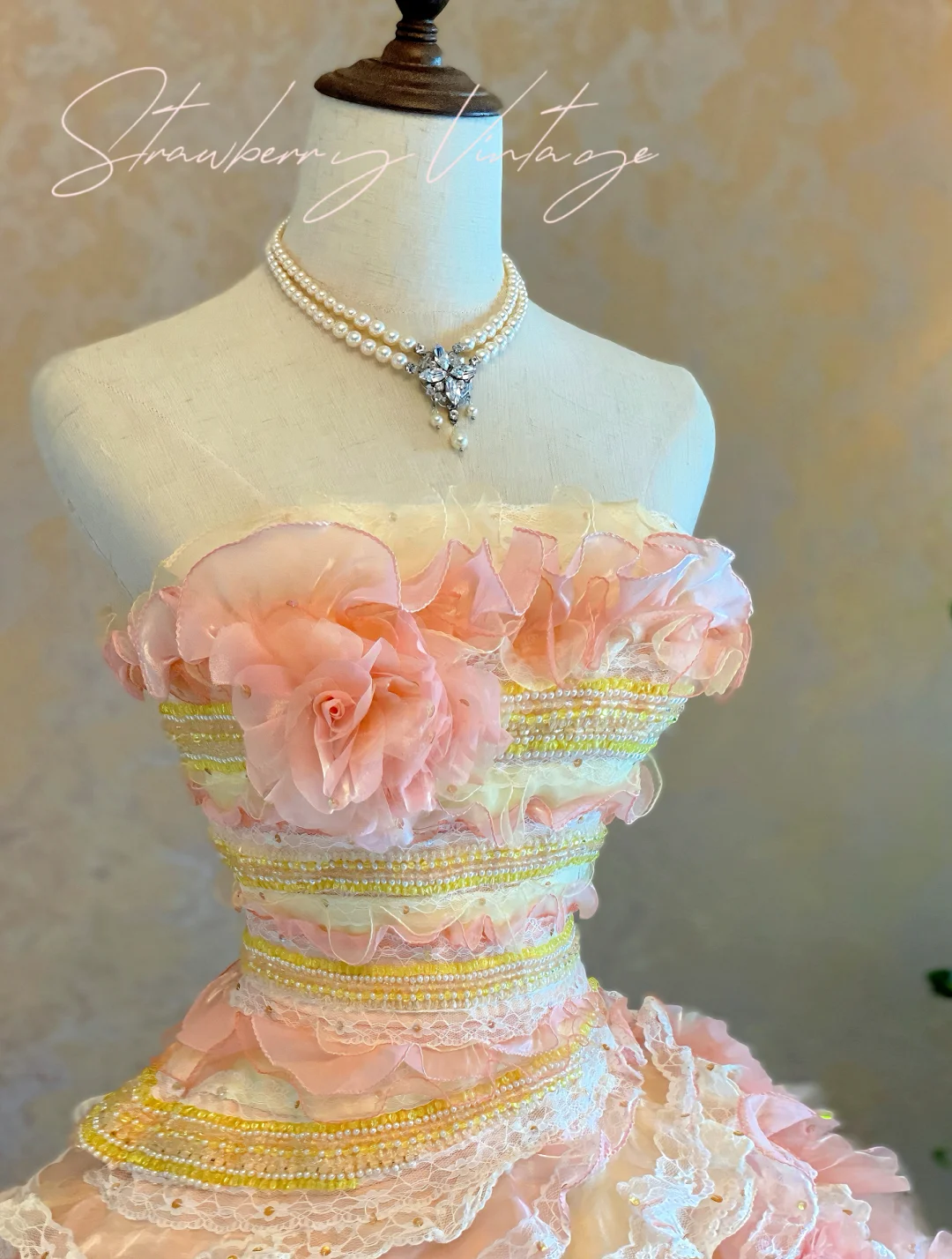 Vintage-Inspired Pastel Pink & Cream Tiered Ruffled Floral Quinceañera Ball Gown TP5158