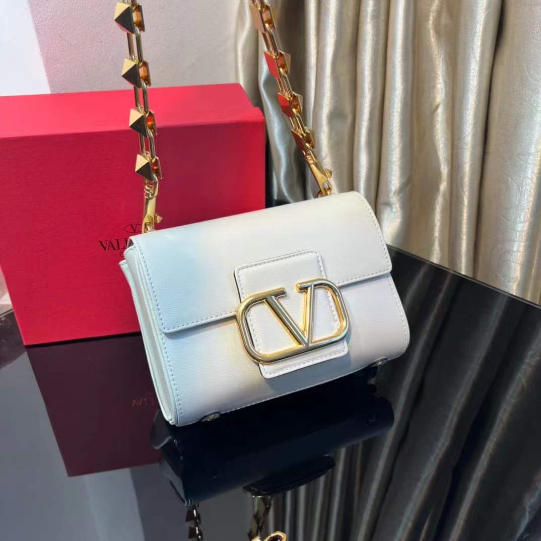 VALENTINO STUD SIGN GRAINY CALFSKIN SHOULDER BAG IN WHITE