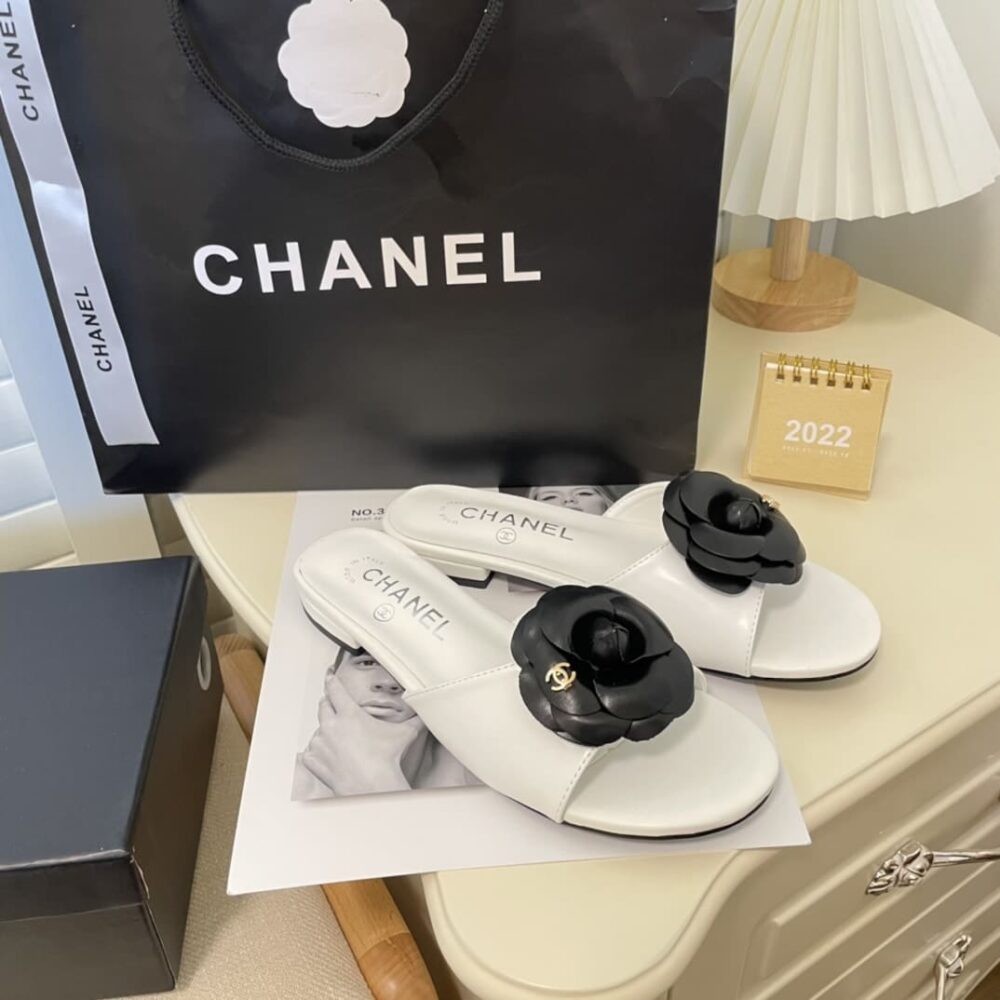 Chanel Black Camellia Slides White
