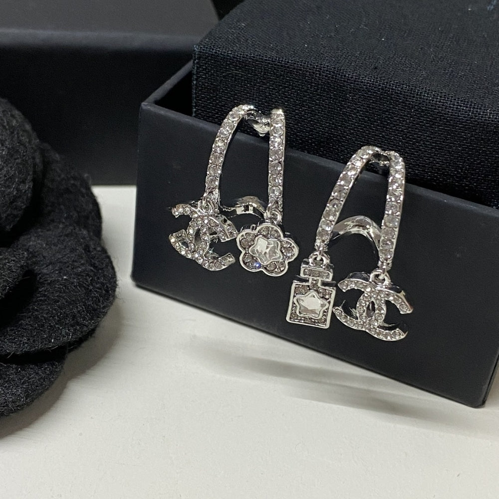 CHANEL PENDANT EARRINGS METAL AND DIAMANTÉS IN SILVER ABF199 B19948 NAFVP