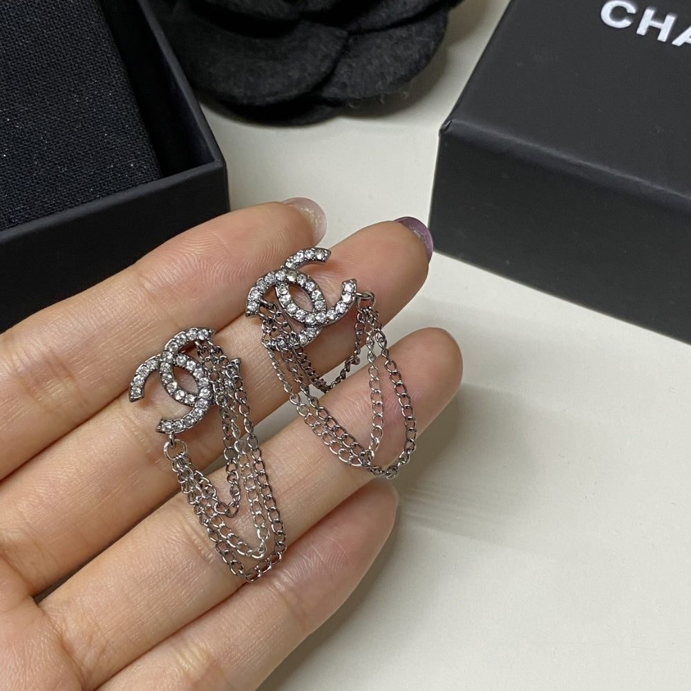 CHANEL STUD EARRINGS WITH CRYSTAL AND MULTI CHAIN IN SILVER TONE