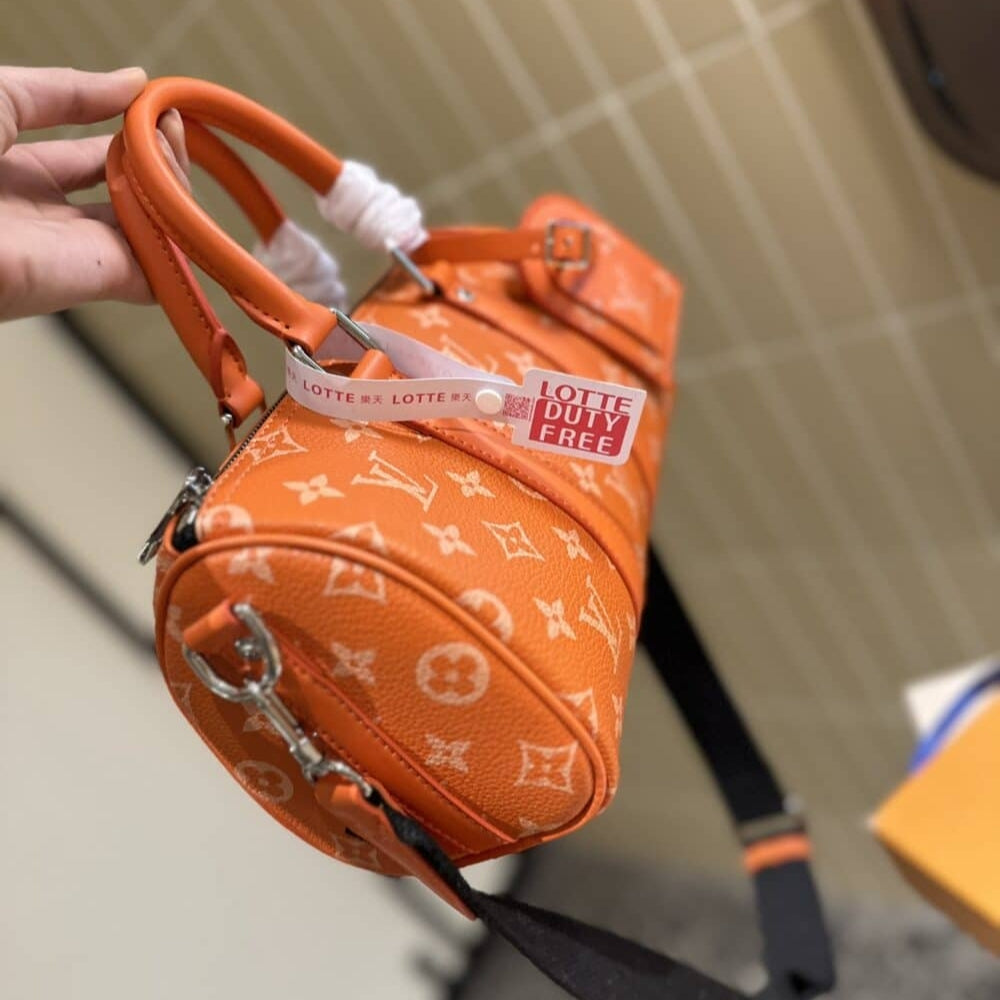 Louis Vuitton Keepall Bandoulière 25 Tangerine 25Cm M31044