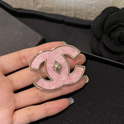 Chanel Cc Logo Brooch In Pink Enamel With Gold Tone Hardware