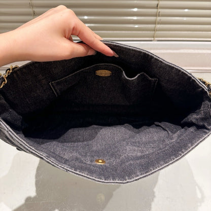 Chanel Maxi Flapbag Washed Denim And Gold Tone Metal Black 30Cm